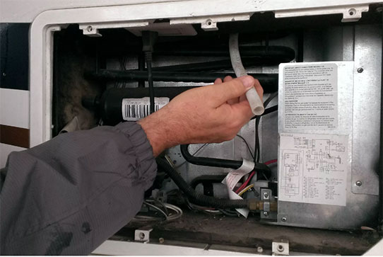 Прочистка слива (дренаж) холодильника в Черноголовке